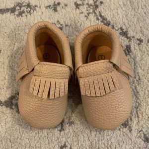 Tan moccasins